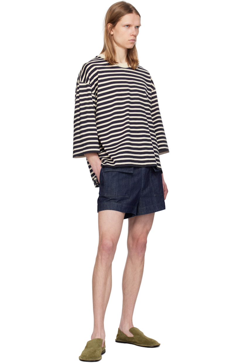 Loose-fit cotton jersey T-shirt. Stripes throughout.

· Rib-knit crewneck
· Logo patch at hem 
· Vented side seams
· Dropped shoulders
· Three-quarter sleeves 
· Logo embroidered at back collar

Supplier color: Navy blue/White cream