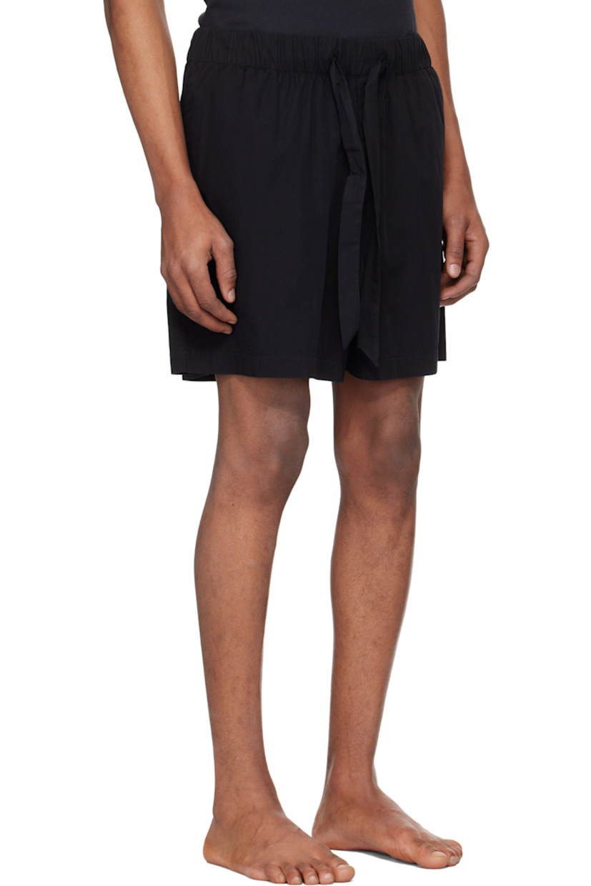 Lightweight stonewashed organic cotton poplin pyjama shorts.

· Wide-leg
· Oeko-Tex ® Standard 100-certified
· Drawstring at elasticized waistband
· Four-pocket styling
· Button fly
· Logo patch at back pocket

Supplier color: All black