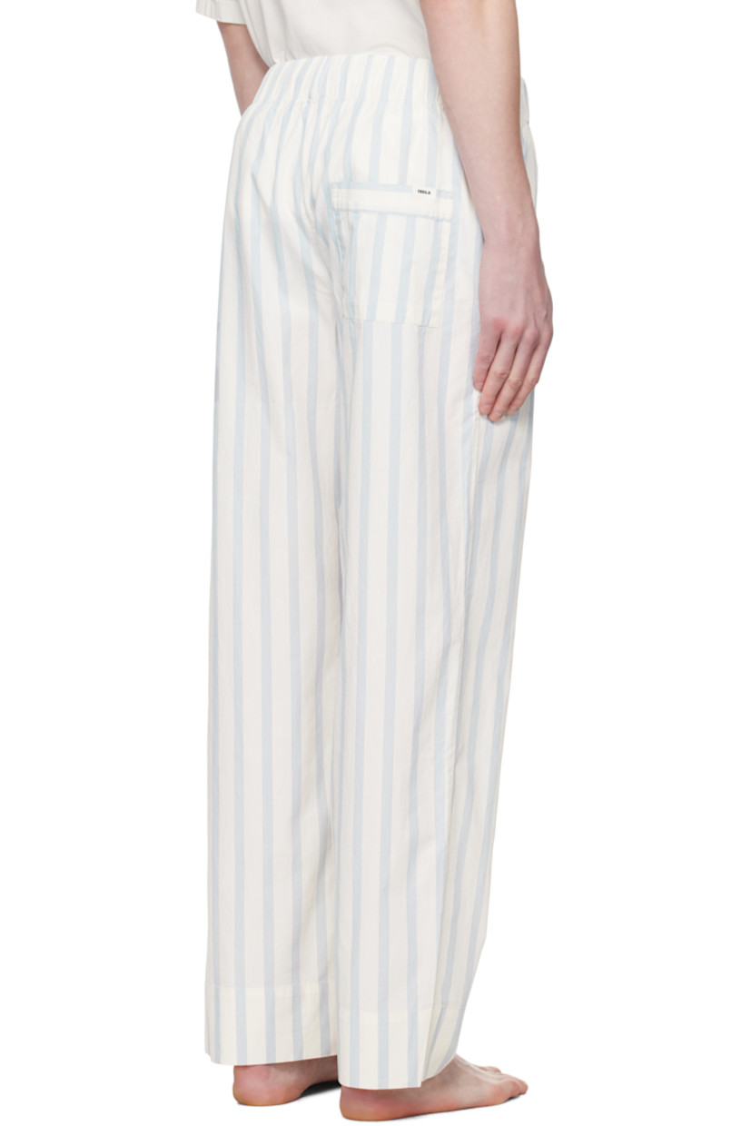 Stonewashed lightweight organic cotton poplin pyjama pants. Oeko-Tex® Standard 100-certified.

· Straight-leg and loose-fit
· Stripes throughout
· Drawstring at elasticized waistband
· Three-pocket styling
· Button fly
· Logo flag at back pocket

Supplier color: Needle stripes