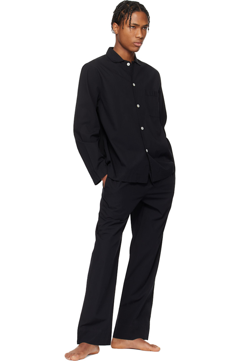 Stonewashed lightweight organic cotton poplin pyjama pants. Oeko-Tex® Standard 100-certified.

· Straight-leg and loose-fit
· Drawstring at elasticized waistband
· Three-pocket styling
· Button fly
· Logo flag at back pocket

Supplier color: All black