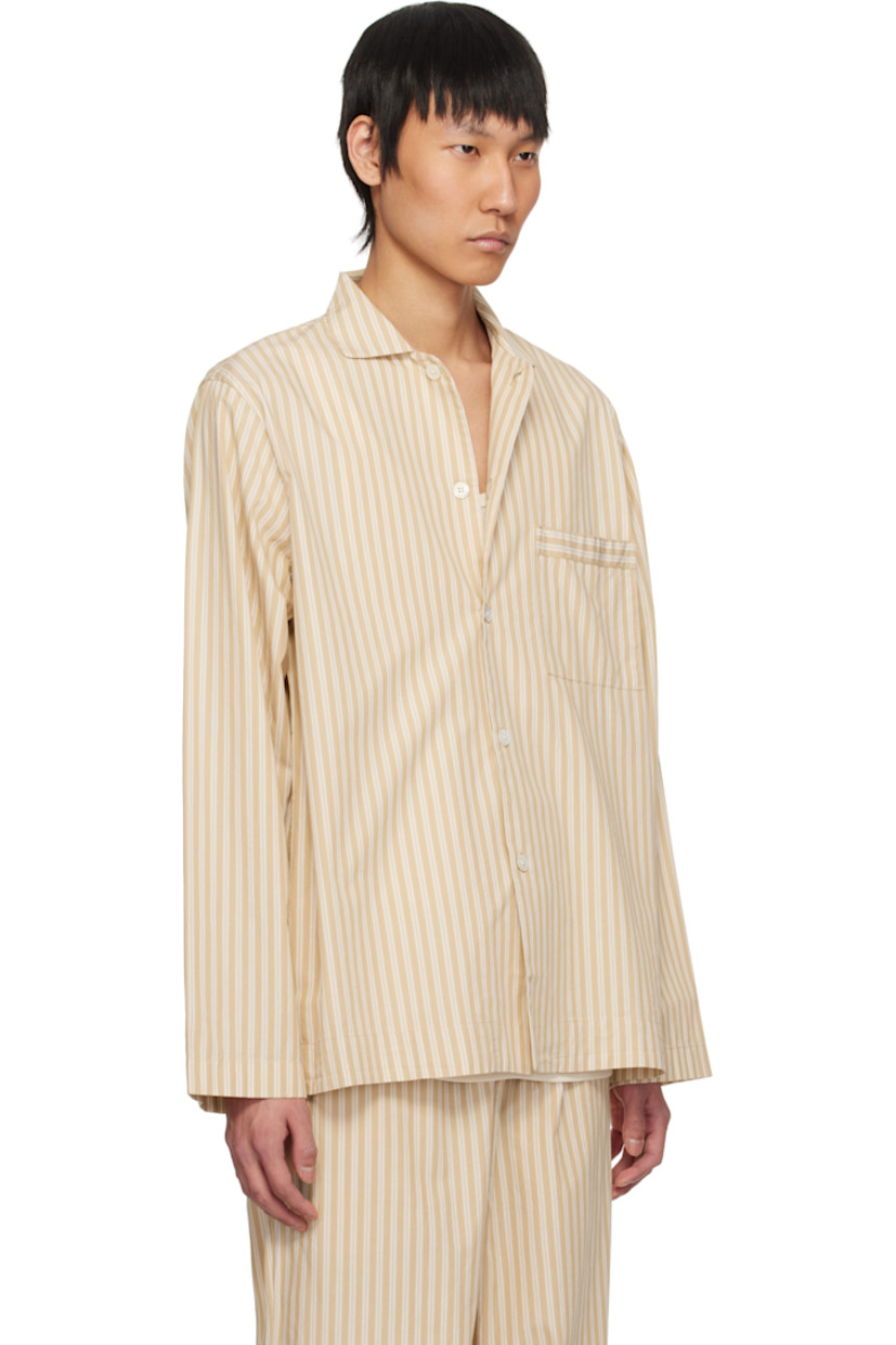 Stonewashed lightweight organic cotton poplin pyjama shirt. Stripes throughout. 

· Oeko-Tex® Standard 100-certified
· Open spread collar
· Button closure
· Patch pocket at chest
· Logo flag at side seam
· Mother-of-pearl hardware

Supplier color: Corinth stripes