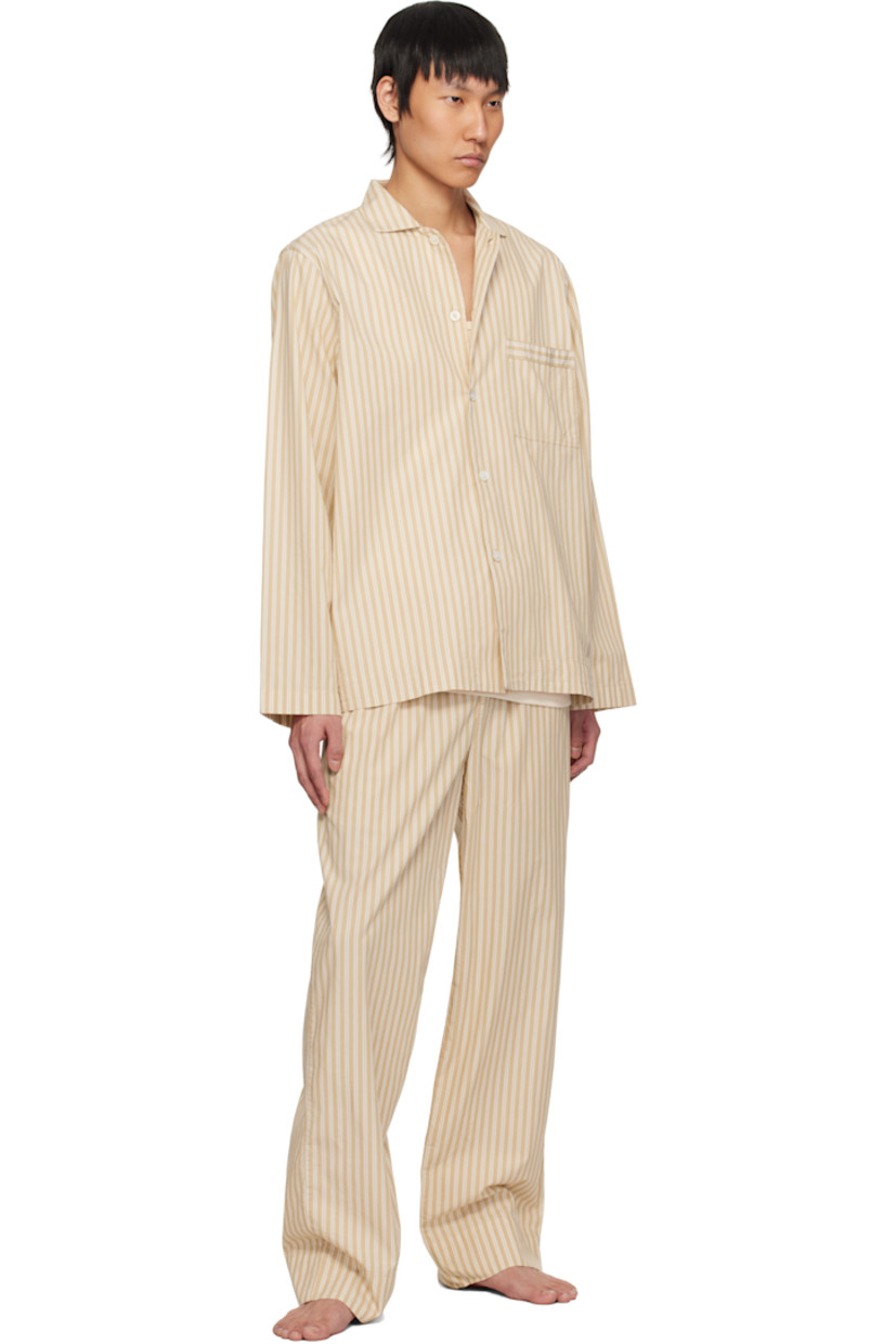 Stonewashed lightweight organic cotton poplin pyjama shirt. Stripes throughout. 

· Oeko-Tex® Standard 100-certified
· Open spread collar
· Button closure
· Patch pocket at chest
· Logo flag at side seam
· Mother-of-pearl hardware

Supplier color: Corinth stripes
