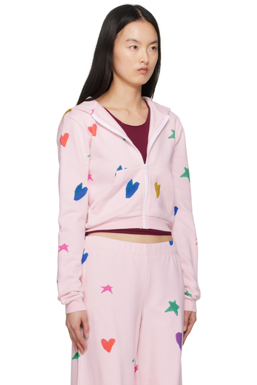 French terry hoodie. Graphic pattern printed throughout.

· Zip closure
· Patch pockets
· Rib-knit cropped hem and cuffs 

Featuring artwork made in collaboration with the children of RIVER FUND NY.

Supplier color: Pink