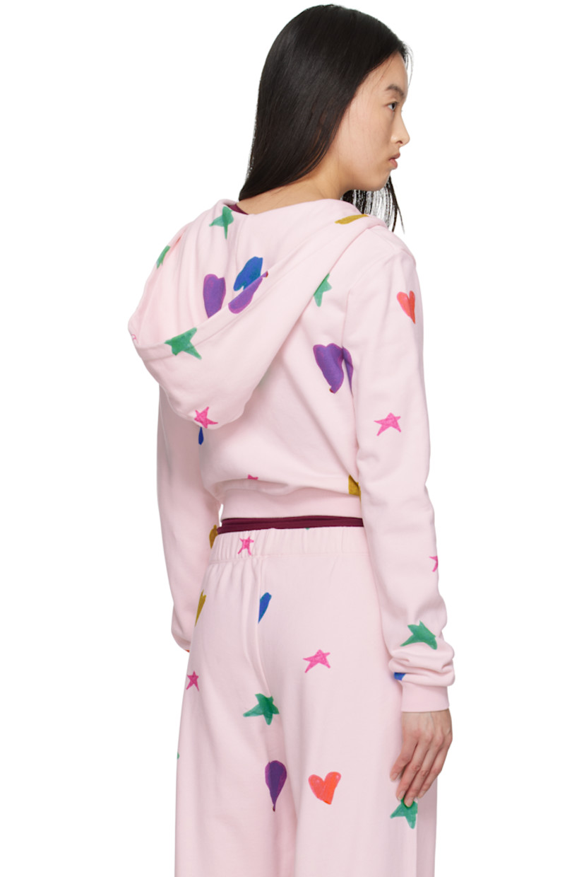 French terry hoodie. Graphic pattern printed throughout.

· Zip closure
· Patch pockets
· Rib-knit cropped hem and cuffs 

Featuring artwork made in collaboration with the children of RIVER FUND NY.

Supplier color: Pink