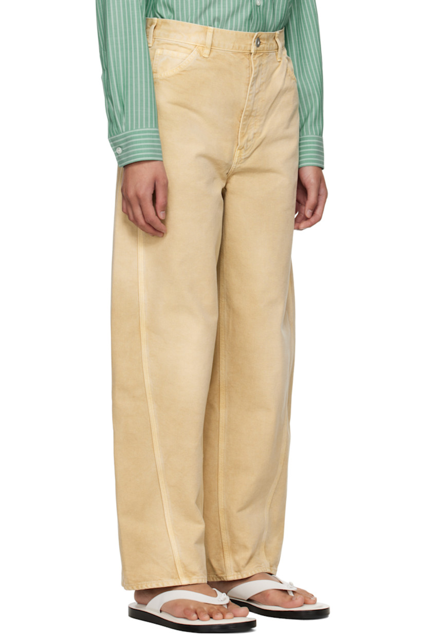 Garment-dyed organic cotton duck canvas trousers. Fading throughout. 

· Wide-leg
· Belt loops
· Five-pocket styling
· Zip fly
· Twisted outseams

Supplier color: Light beige