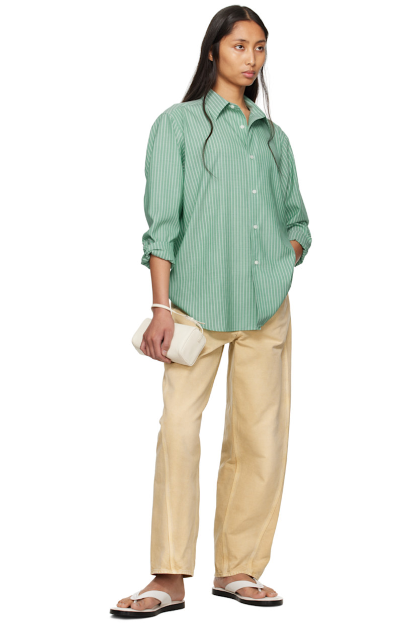 Garment-dyed organic cotton duck canvas trousers. Fading throughout. 

· Wide-leg
· Belt loops
· Five-pocket styling
· Zip fly
· Twisted outseams

Supplier color: Light beige