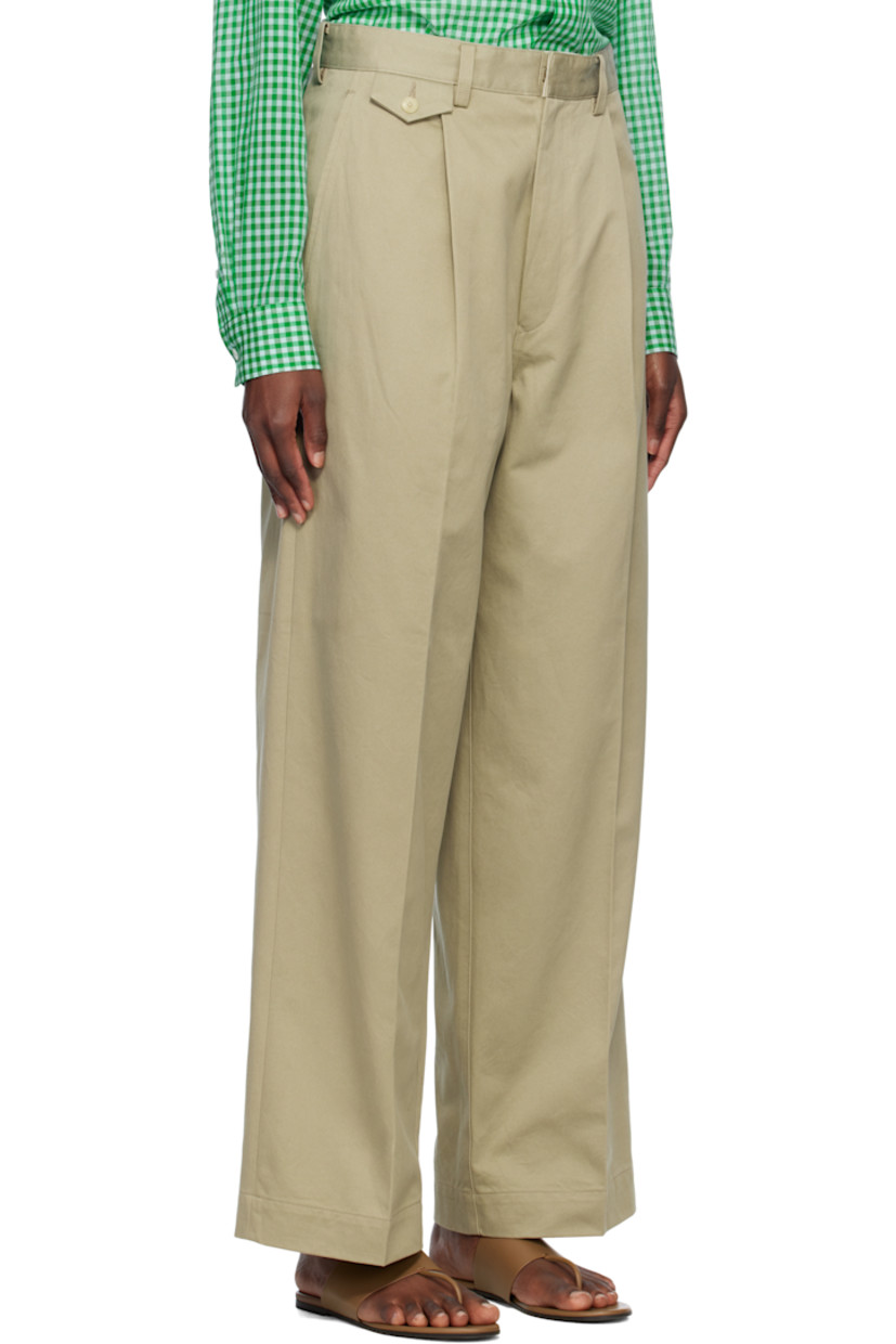 Wide-leg cotton twill trousers.

· Belt loops
· Five-pocket styling
· Zip fly
· Pleats at front
· Creased legs

Supplier color: Light khaki
