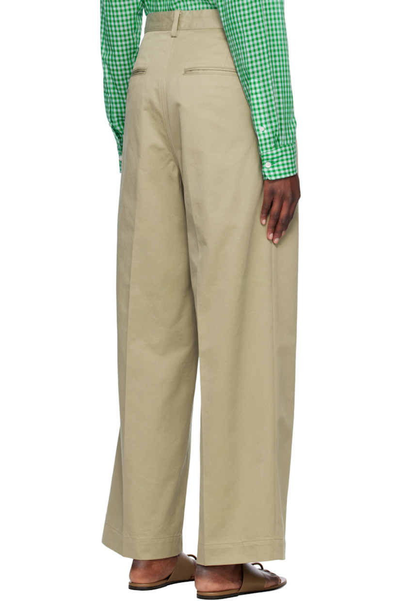 Wide-leg cotton twill trousers.

· Belt loops
· Five-pocket styling
· Zip fly
· Pleats at front
· Creased legs

Supplier color: Light khaki