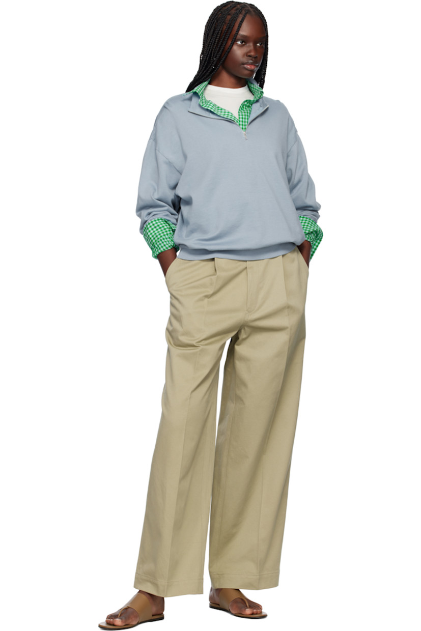 Wide-leg cotton twill trousers.

· Belt loops
· Five-pocket styling
· Zip fly
· Pleats at front
· Creased legs

Supplier color: Light khaki
