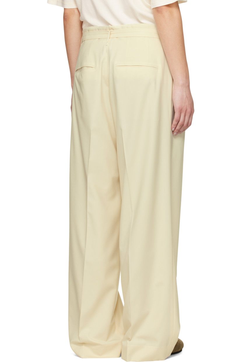 Wide-leg Superfine 180s wool twill trousers.

· Belt loops 
· Detachable pin-buckle belt at waistband
· Four-pocket styling
· Zip fly
· Pleats at front
· Creased legs
· Partial cupro satin lining

Supplier color: Ivory