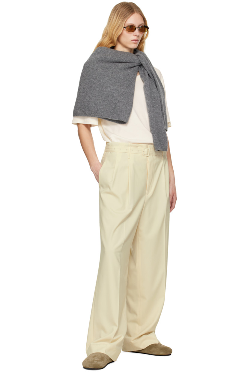 Wide-leg Superfine 180s wool twill trousers.

· Belt loops 
· Detachable pin-buckle belt at waistband
· Four-pocket styling
· Zip fly
· Pleats at front
· Creased legs
· Partial cupro satin lining

Supplier color: Ivory