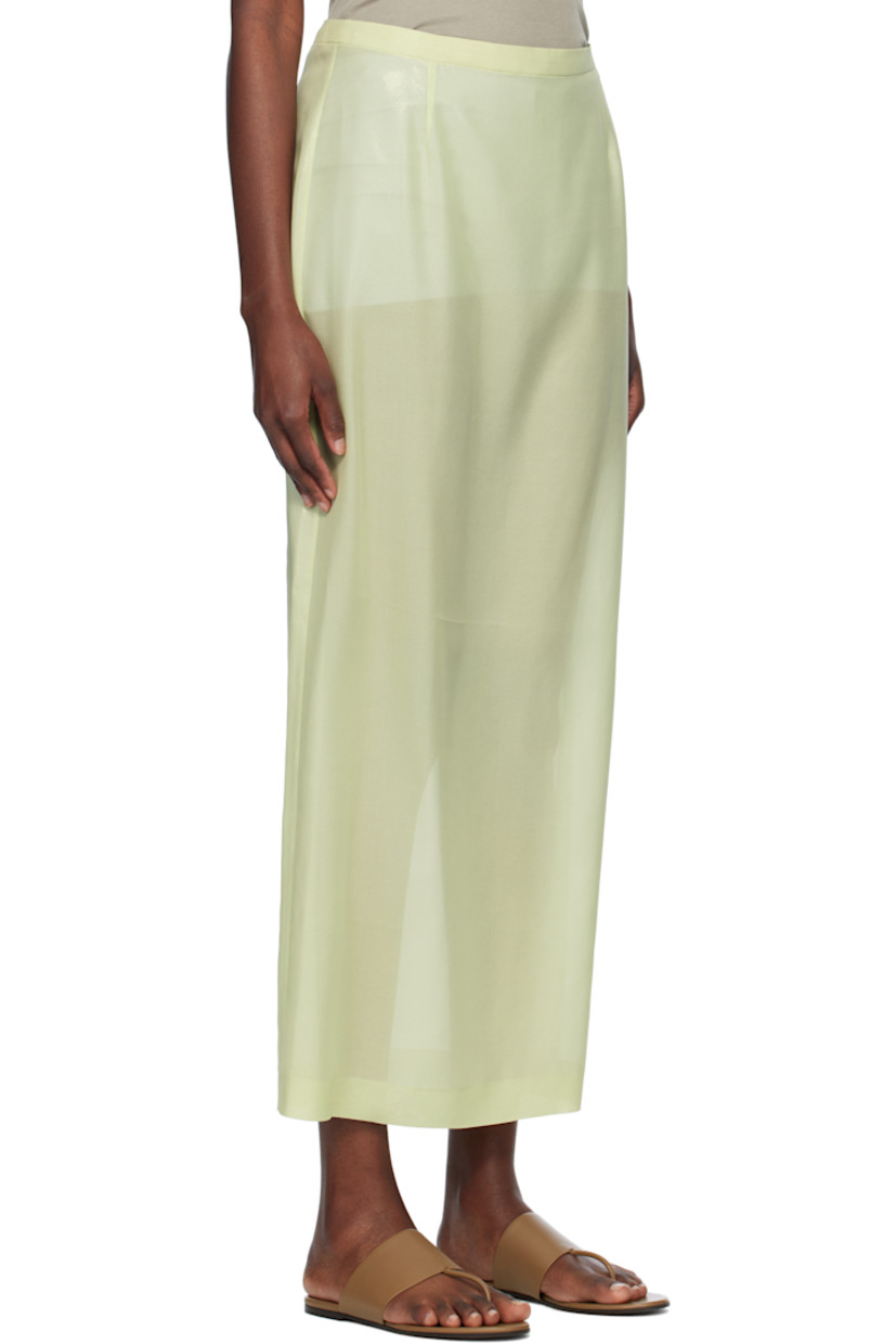 Foil-coated silk lawn cloth maxi skirt.

· Semi-sheer
· Darts at waist
· Zip closure and slit at back

Supplier color: Pale green