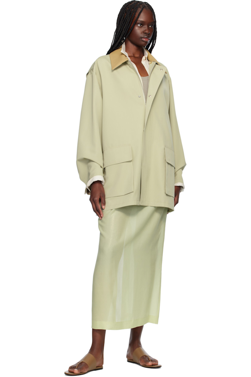 Foil-coated silk lawn cloth maxi skirt.

· Semi-sheer
· Darts at waist
· Zip closure and slit at back

Supplier color: Pale green