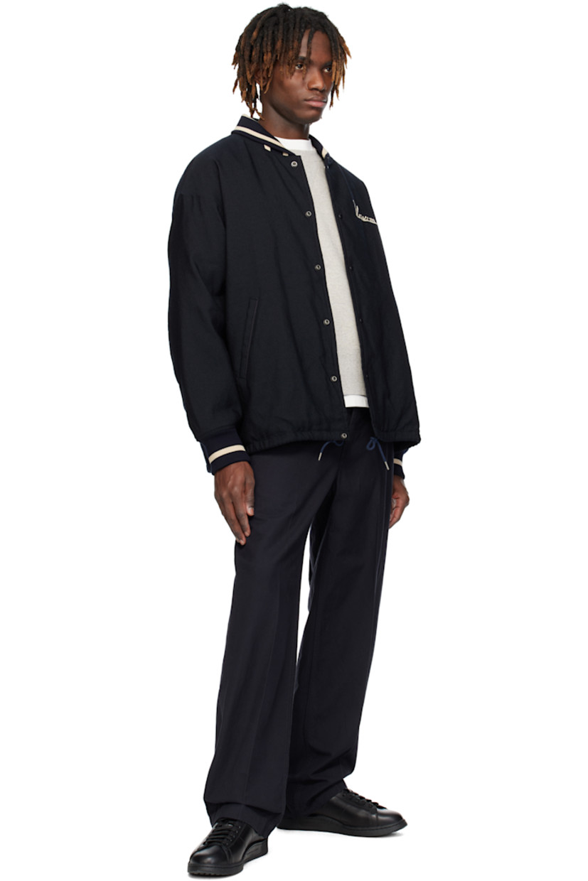 Wide-leg cotton twill trousers.

· Belt loops
· Five-pocket styling
· Button-fly
· Creased legs

Supplier color: Navy
