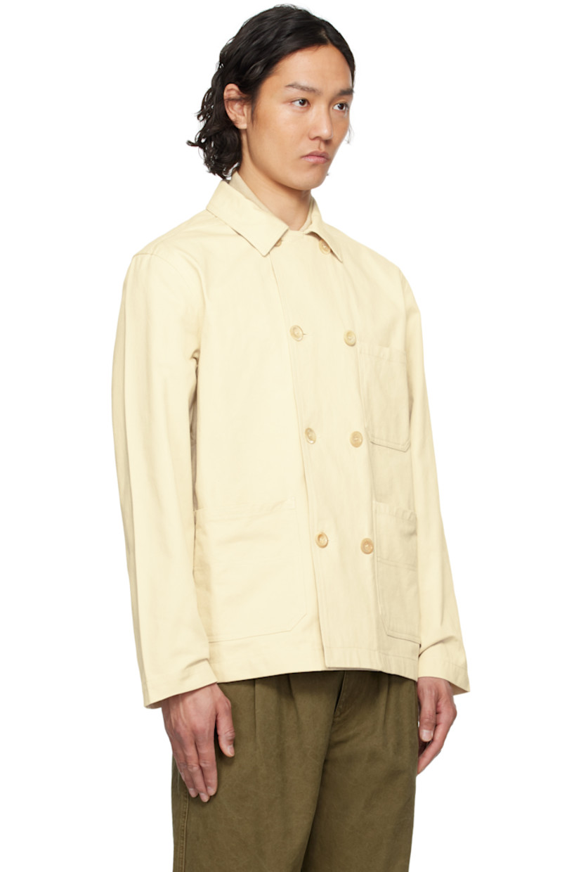 Cotton twill jacket.

· Spread collar
· Double-breasted button closure
· Patch pockets 
· Patch pockets at interior
· Unlined 

Supplier color: Ecru
