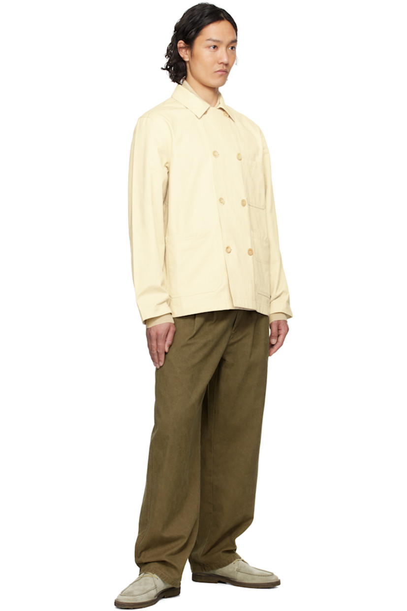 Cotton twill jacket.

· Spread collar
· Double-breasted button closure
· Patch pockets 
· Patch pockets at interior
· Unlined 

Supplier color: Ecru