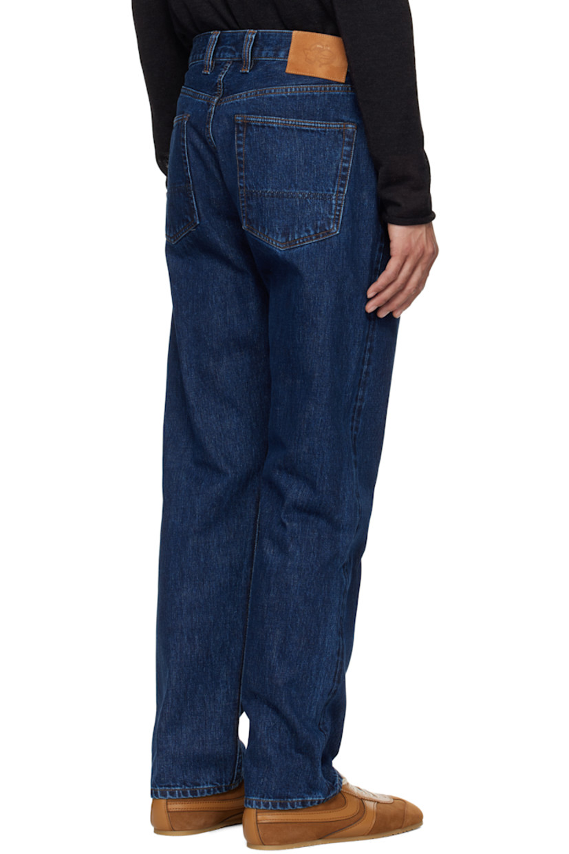 Stonewashed 14.2 oz non-stretch selvage denim jeans. Fading throughout.

· Tapered leg
· High-rise
· Belt loops
· Five-pocket styling
· Button-fly
· Suede logo patch at back waistband
· Logo-engraved silver- and copper-tone hardware
· Contrast stitching in tan

Supplier color: Stone wash