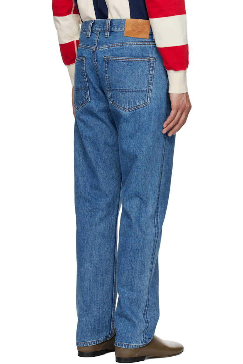 Stonewashed 14.2 oz non-stretch selvage denim jeans. Fading throughout.

· Tapered leg
· High-rise
· Belt loops
· Five-pocket styling
· Button-fly
· Suede logo patch at back waistband
· Logo-engraved silver- and copper-tone hardware
· Contrast stitching in tan

Supplier color: Bleach wash