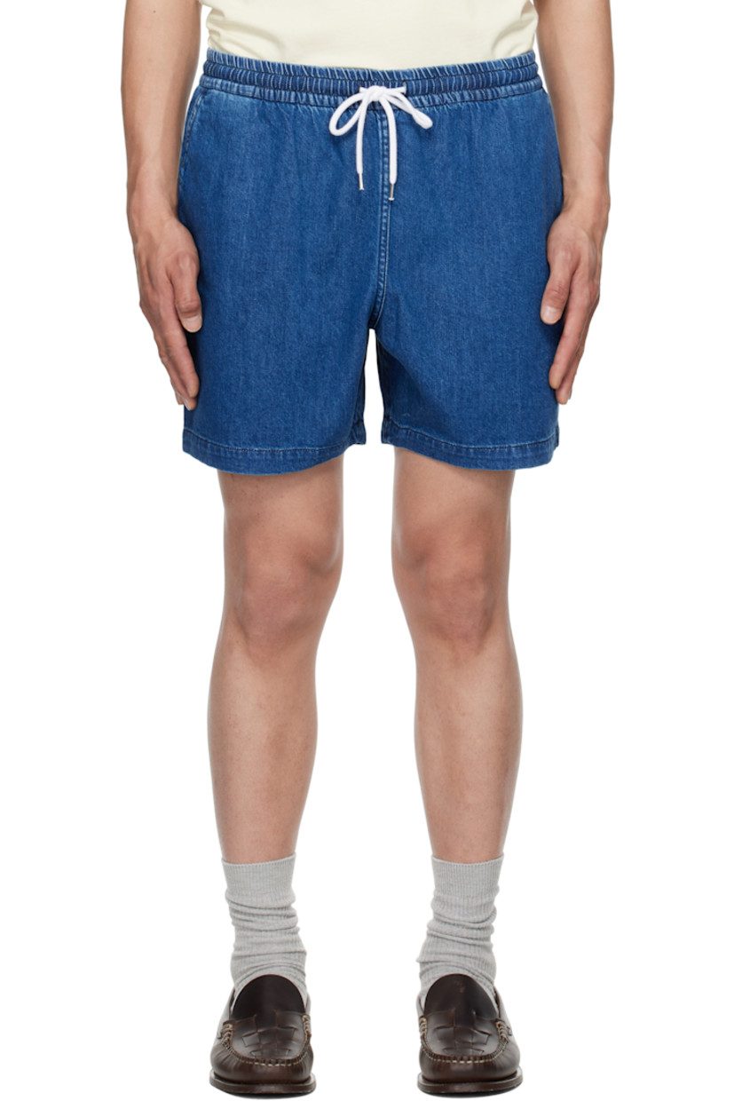Stonewashed non-stretch denim shorts. Fading throughout.

· High-rise
· Drawstring at elasticized waistband
· Four-pocket styling

Supplier color: Stone wash indigo