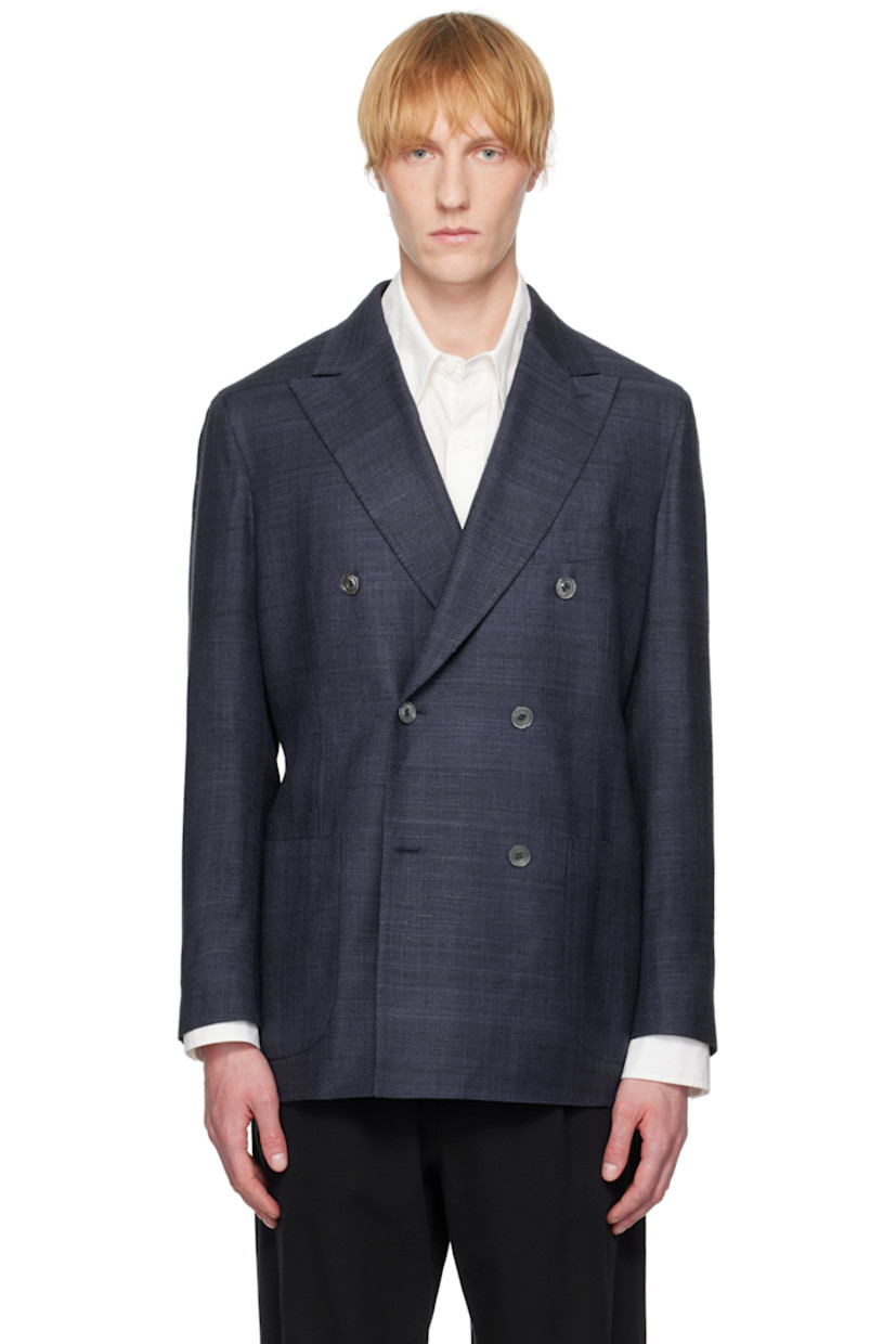 Plain-woven raw tussah silk blazer. Subtle distressing throughout.

· Peaked lapel
· Double-breasted button closure
· Welt and patch pockets
· Four-button surgeons cuffs
· Vented hem at back
· Welt pockets at interior
· Unlined
· Horn hardware

Supplier color: Navy
