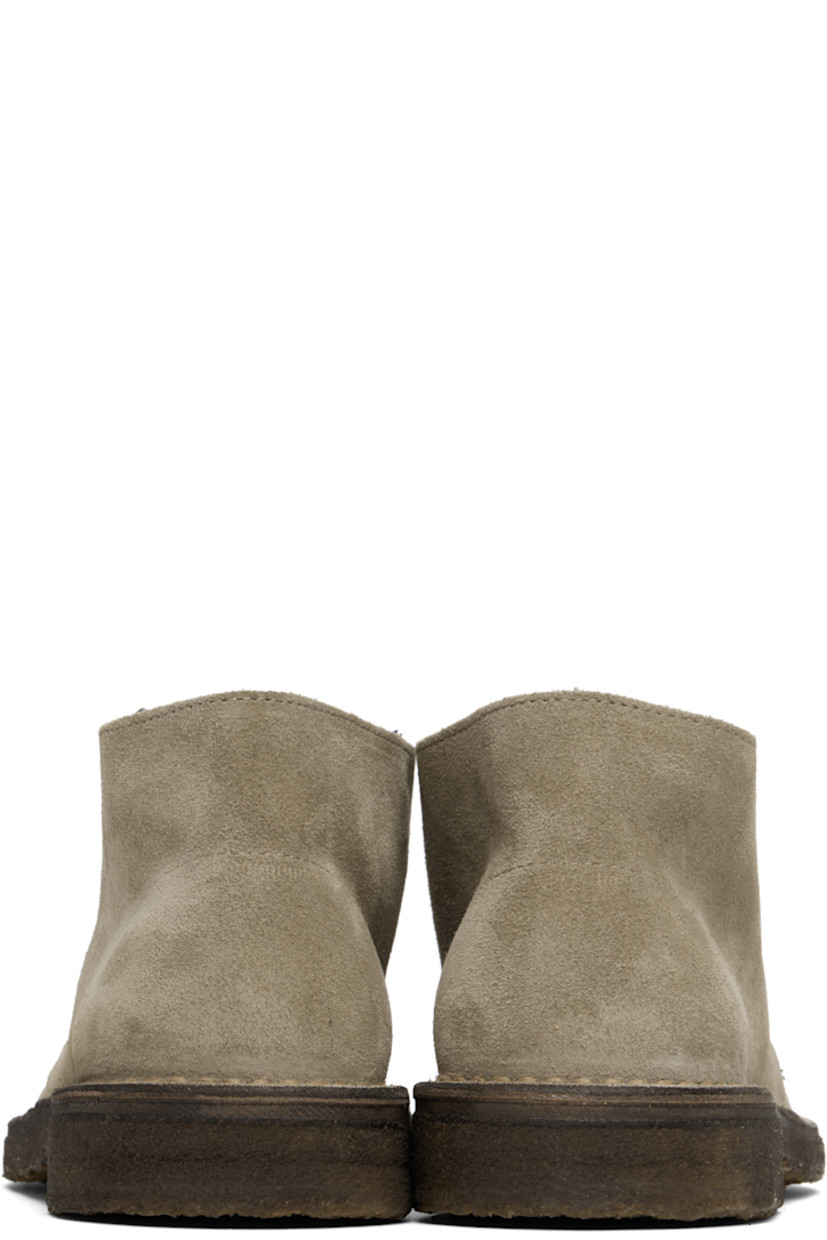 Ankle-high suede desert boots in beige.

· Lace-up closure
· Crêpe rubber sole

Supplier color: Sand suede