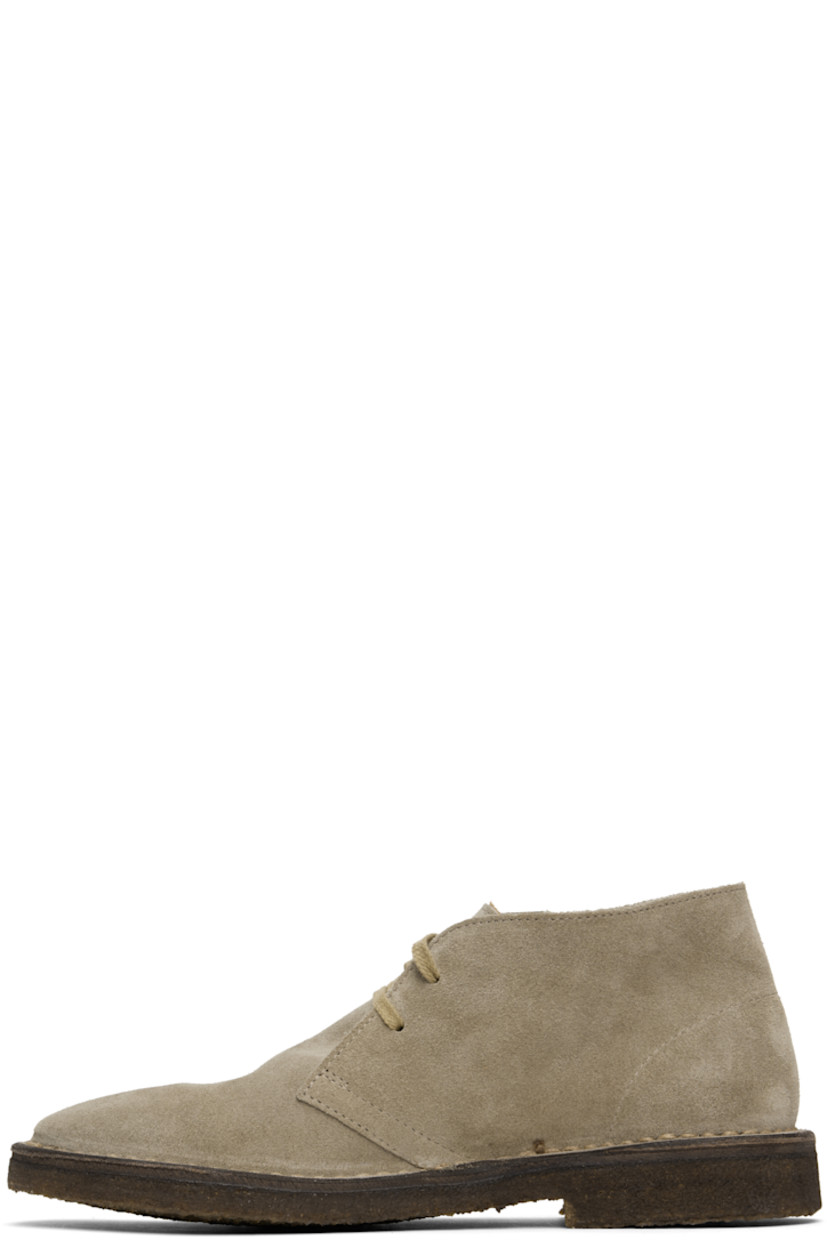 Ankle-high suede desert boots in beige.

· Lace-up closure
· Crêpe rubber sole

Supplier color: Sand suede