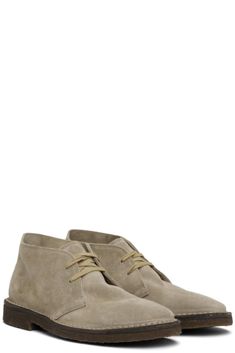 Ankle-high suede desert boots in beige.

· Lace-up closure
· Crêpe rubber sole

Supplier color: Sand suede