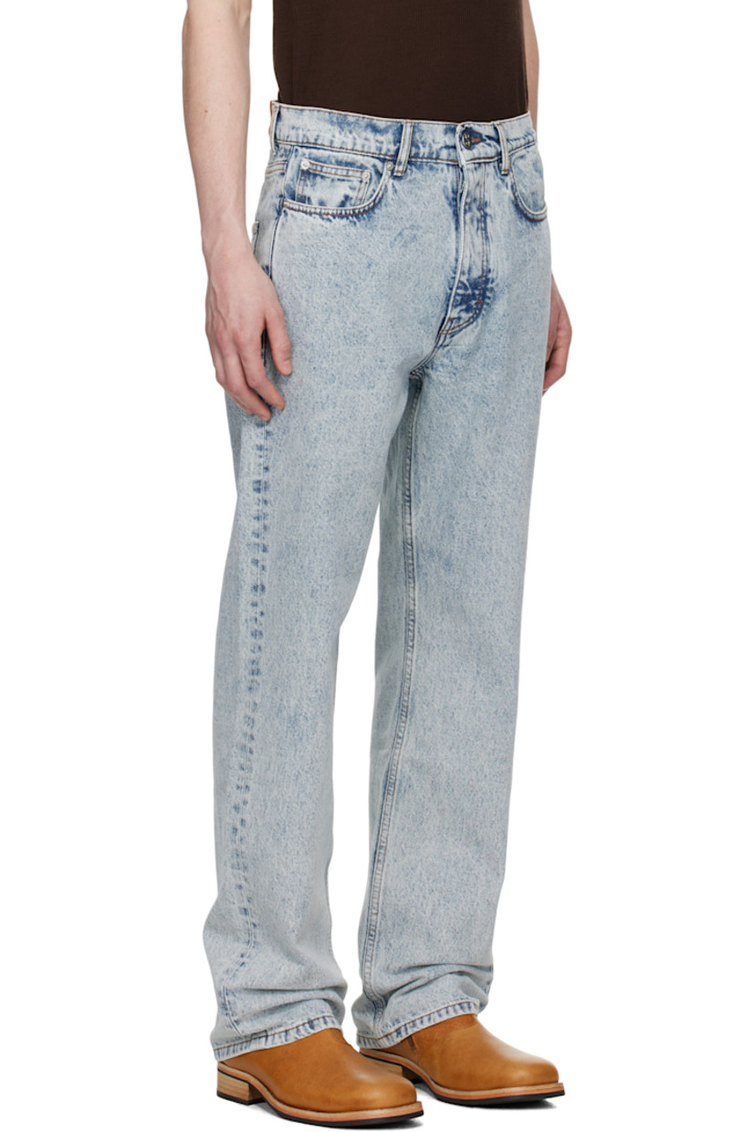 Straight-leg stonewashed 13 oz non-stretch denim jeans. Fading throughout.

· Mid-rise
· Belt loops
· Five-pocket styling
· Button fly
· Suede logo patch at back waistband
· Logo-engraved silver-tone hardware
· Contrast stitching in tan 

Supplier color: New stone wash