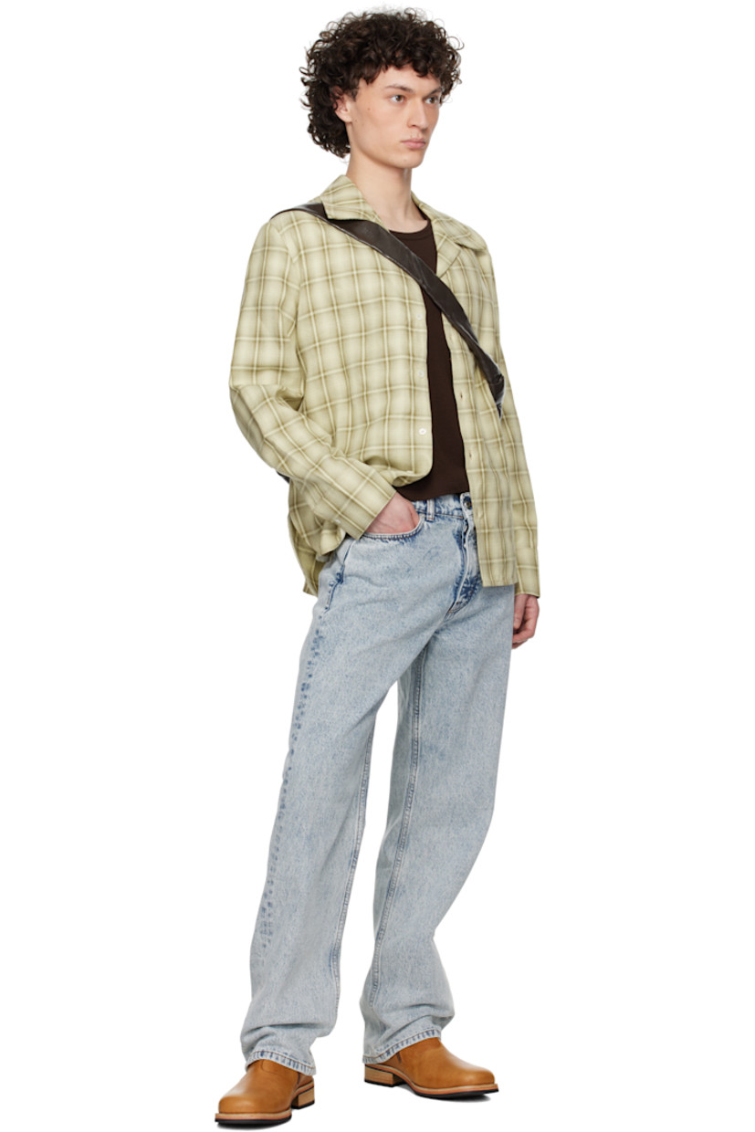 Straight-leg stonewashed 13 oz non-stretch denim jeans. Fading throughout.

· Mid-rise
· Belt loops
· Five-pocket styling
· Button fly
· Suede logo patch at back waistband
· Logo-engraved silver-tone hardware
· Contrast stitching in tan 

Supplier color: New stone wash