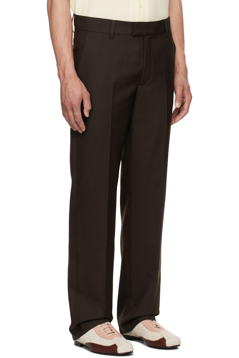 Lightweight polyester- and wool-blend twill trousers. 

· Straight-leg
· Belt loops
· Four-pocket styling
· Zip-fly
· Creased legs
· Partial twill lining

Supplier color: Sludge wool