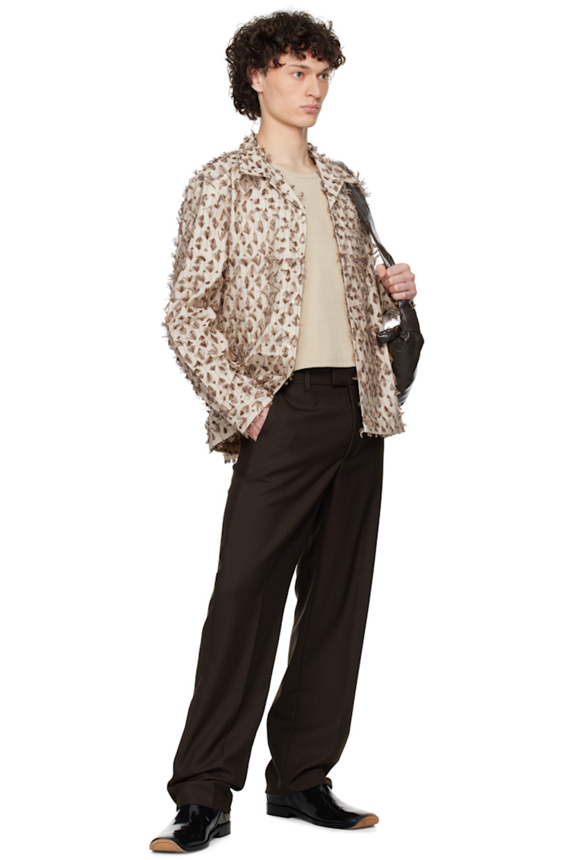 Lightweight cotton-blend poplin shirt. Fringe detailing throughout.

· Open spread collar
· Button closure
· Adjustable buttoned barrel cuffs
· Mother-of-pearl hardware

Supplier color: Feather poplin