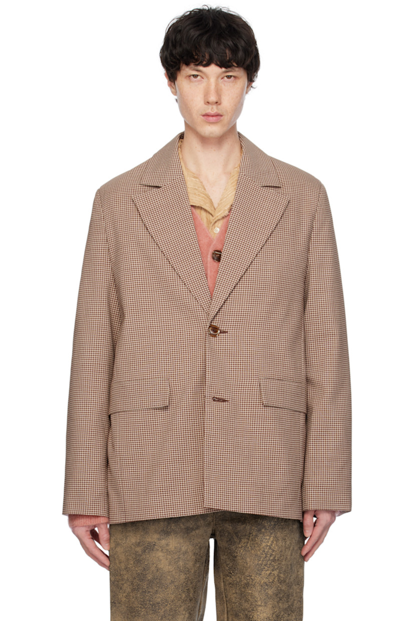 Polyester- and wool-blend tweed blazer. Check pattern throughout. 

· Notched lapel
· Button closure
· Flap pockets
· Central vent at back hem
· Welt pocket at interior 
· Full satin lining

Supplier color: Senior check