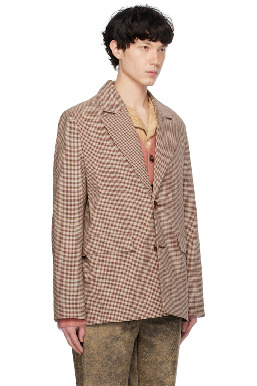 Polyester- and wool-blend tweed blazer. Check pattern throughout. 

· Notched lapel
· Button closure
· Flap pockets
· Central vent at back hem
· Welt pocket at interior 
· Full satin lining

Supplier color: Senior check