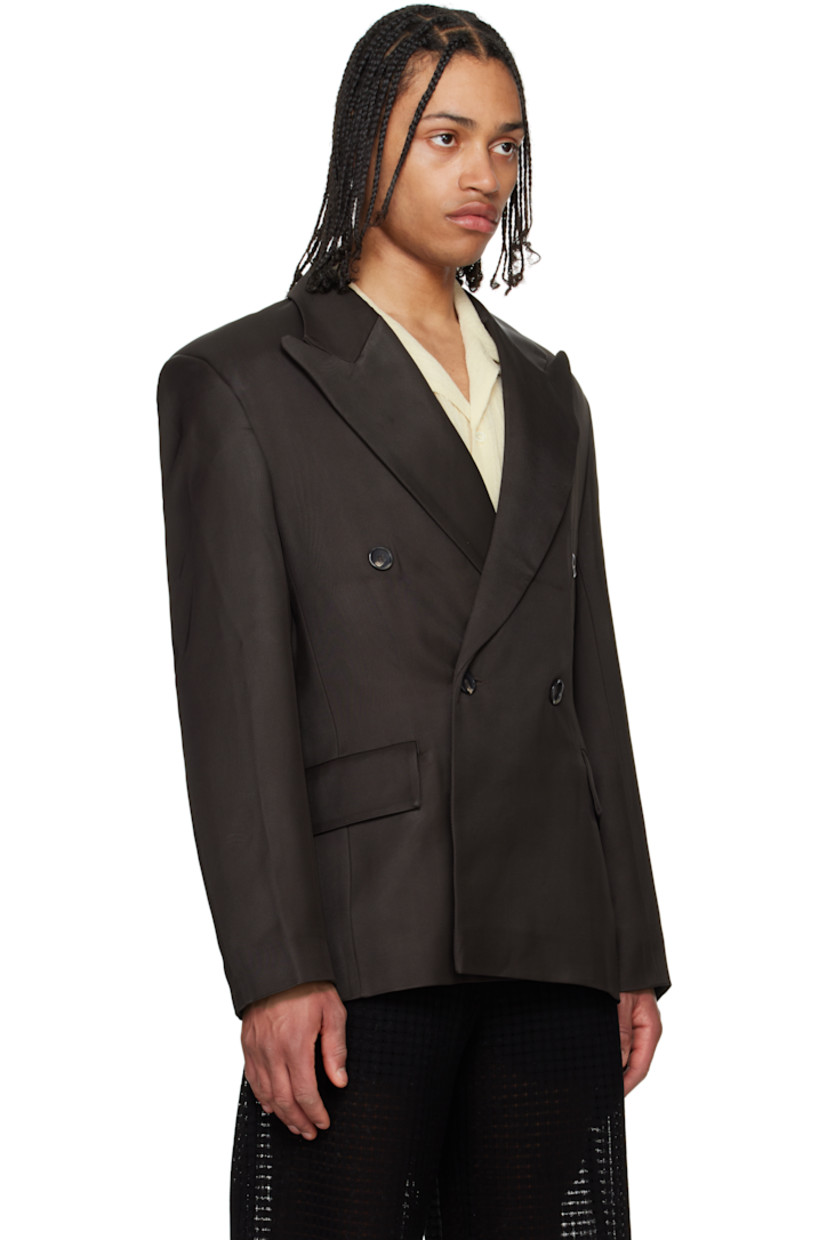Heavyweight viscose twill blazer.

· Peaked lapel
· Double-breasted button closure
· Flap pockets
· Padded shoulders
· Central vent at back hem
· Welt pocket at interior
· Full satin lining
· Horn hardware

Supplier color: Obsidian viscose