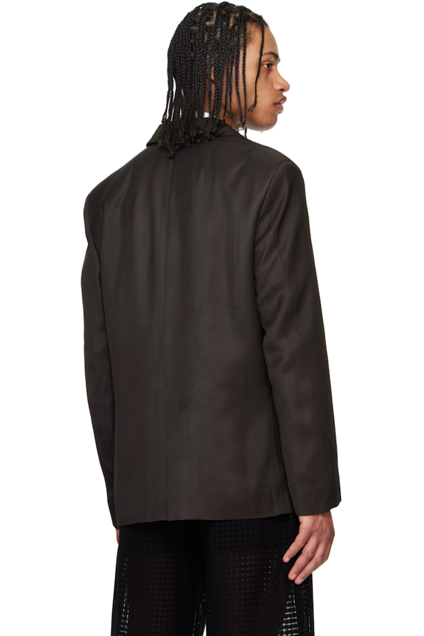 Heavyweight viscose twill blazer.

· Peaked lapel
· Double-breasted button closure
· Flap pockets
· Padded shoulders
· Central vent at back hem
· Welt pocket at interior
· Full satin lining
· Horn hardware

Supplier color: Obsidian viscose