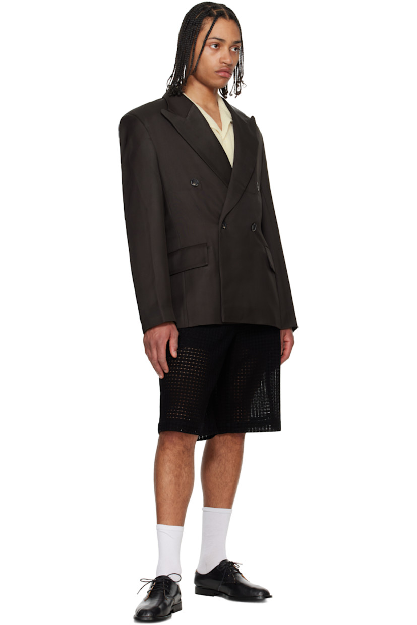 Heavyweight viscose twill blazer.

· Peaked lapel
· Double-breasted button closure
· Flap pockets
· Padded shoulders
· Central vent at back hem
· Welt pocket at interior
· Full satin lining
· Horn hardware

Supplier color: Obsidian viscose