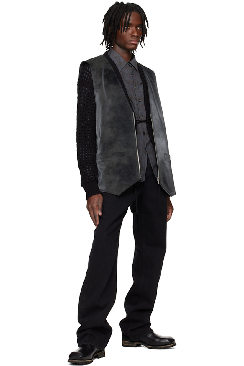 Faux-suede vest. Subtle fading throughout.

· Y-neck
· Zip closure
· Welt pockets
· Lace-up detailing at side seams
· Hardware at back collar
· Full satin lining
· Logo-engraved silver-tone hardware

Supplier color: Black grey