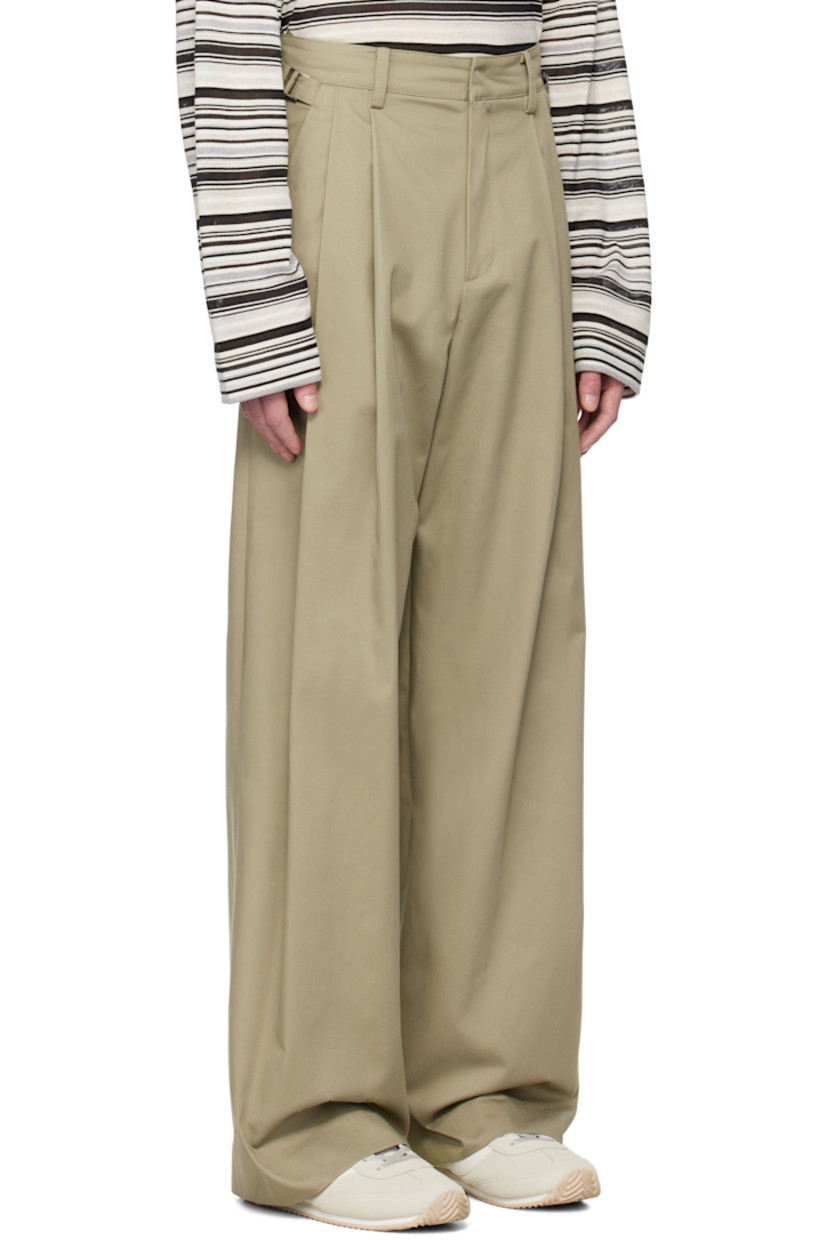 Wide-leg cotton-blend twill trousers. 

· Belt loops
· Adjustable cinch tabs at waistband
· Four-pocket styling
· Zip fly
· Pleats at front 
· Partial plain-woven lining  

Available exclusively at SSENSE.

Supplier color: SG