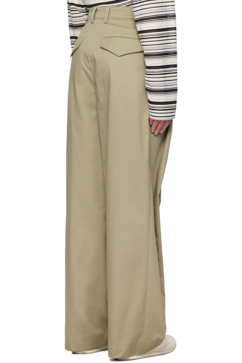 Wide-leg cotton-blend twill trousers. 

· Belt loops
· Adjustable cinch tabs at waistband
· Four-pocket styling
· Zip fly
· Pleats at front 
· Partial plain-woven lining  

Available exclusively at SSENSE.

Supplier color: SG