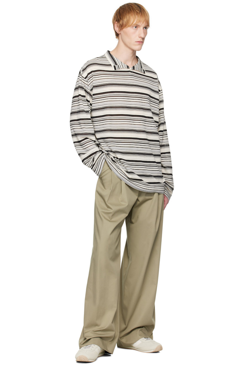 Wide-leg cotton-blend twill trousers. 

· Belt loops
· Adjustable cinch tabs at waistband
· Four-pocket styling
· Zip fly
· Pleats at front 
· Partial plain-woven lining  

Available exclusively at SSENSE.

Supplier color: SG