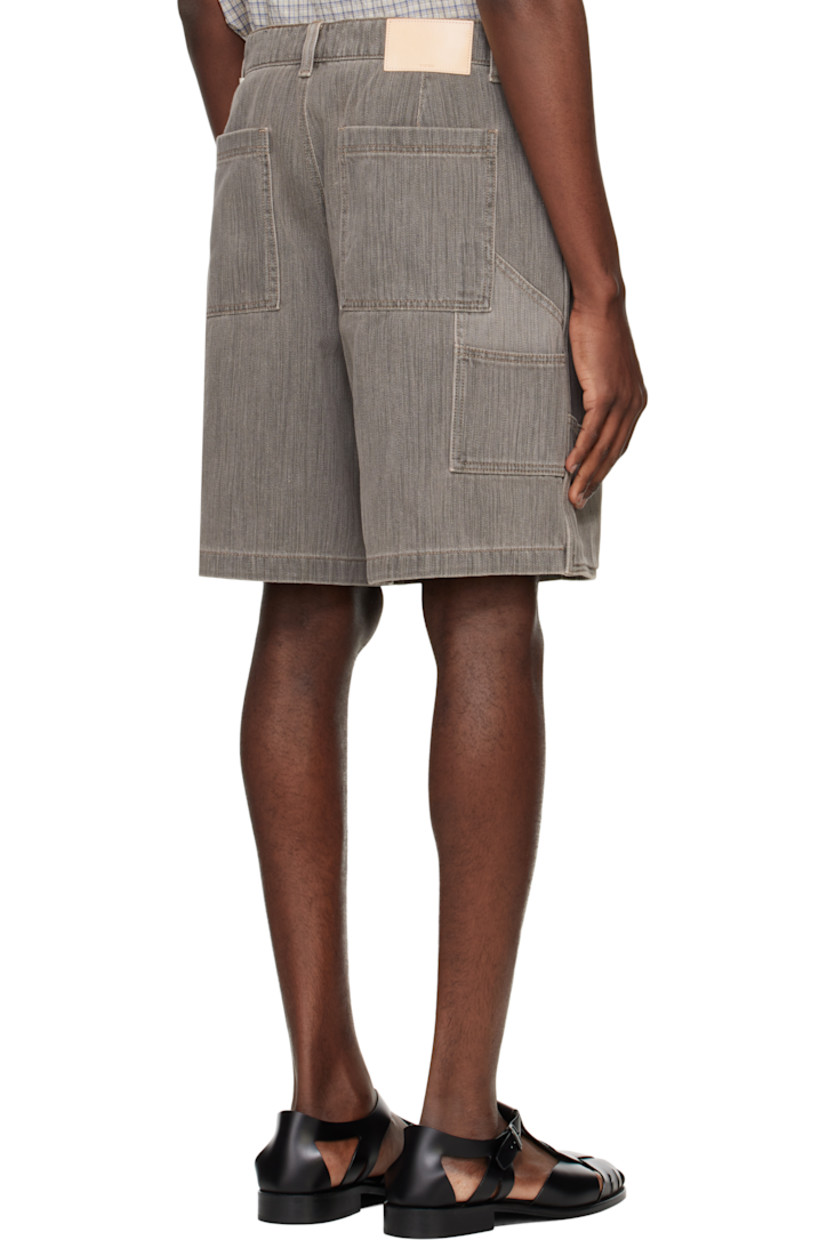 Non-stretch denim shorts.

· Belt loops
· Five-pocket styling
· Zip fly
· Patch pockets at front and back legs
· Hammer-loop at back leg
· Logo hardware at back belt loop
· Leather logo patch at back waistband
· Logo-engraved silver-tone hardware
· Contrast stitching in beige

Supplier color: Sepia grey
