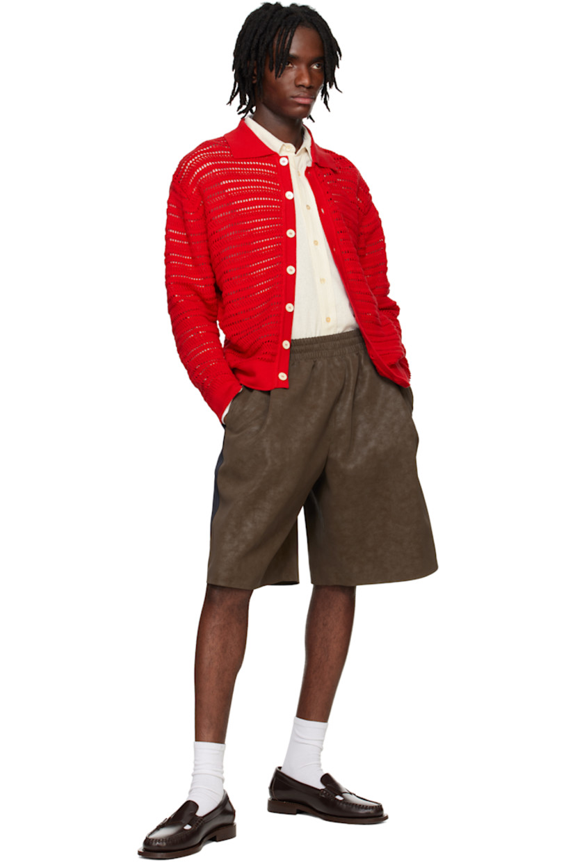 Faux-suede shorts. Subtle fading throughout.

· Elasticized waistband
· Three-pocket styling
· Pleats at front
· Contrast satin trim at outseams
· Full satin lining

Supplier color: Sepia brown