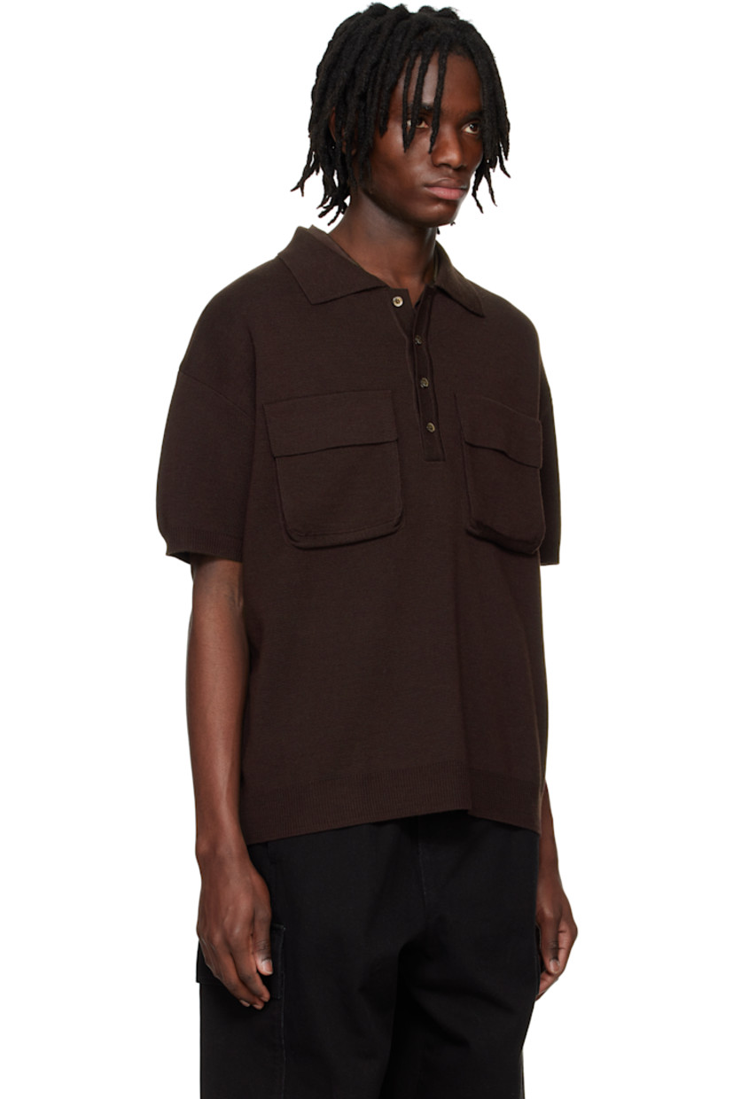 Knit wool-blend polo.

· Spread collar
· Four-button placket
· Bellows pockets at chest
· Rib-knit hem and cuffs
· Dropped shoulders
· Logo plaque at back collar 

Supplier color: Chocolate brown