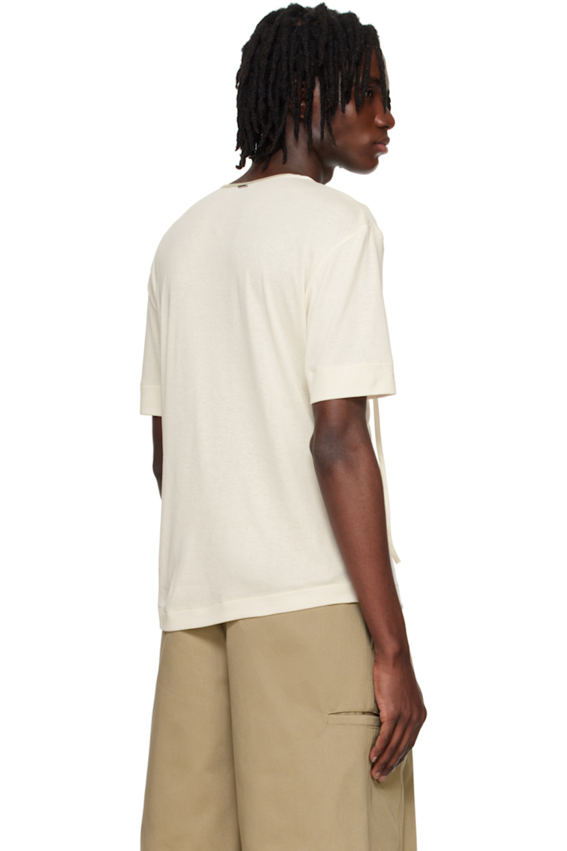 Rayon- and cotton-blend jersey T-shirt.

· Satin trim at crewneck
· Self-tie fastening at open placket
· Hardware at back collar

Supplier color: Ivory