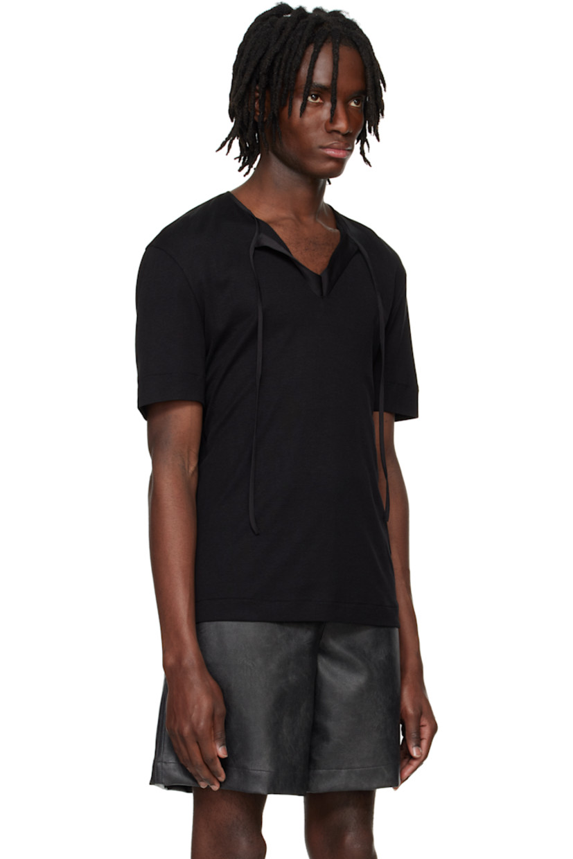 Rayon- and cotton-blend jersey T-shirt.

· Satin trim at crewneck
· Self-tie fastening at open placket
· Hardware at back collar

Supplier color: Black