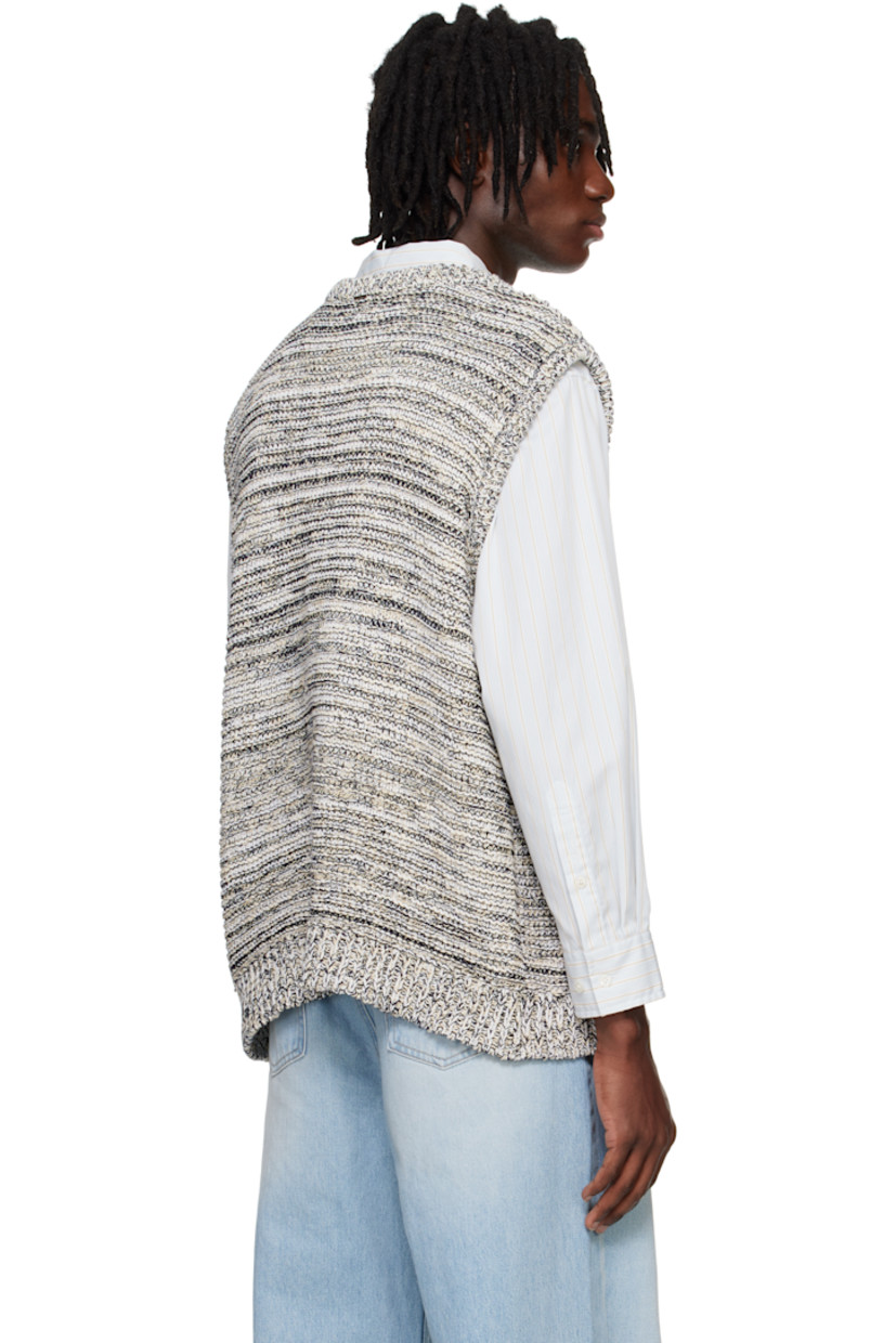 Knit cotton-blend vest.

· Rib-knit scoop neck, hem, and armscyes
· Hardware at back collar

Supplier color: Black