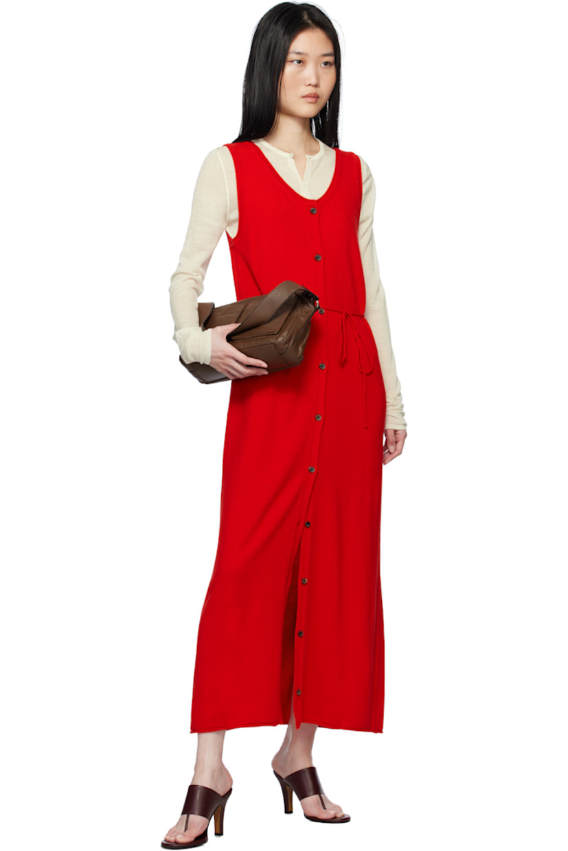 Knit wool-blend maxi dress.

· Rolled edge at scoop neck, hem, and armscyes
· Button closure 
· Detachable self-tie belt at waist 

Supplier color: Red