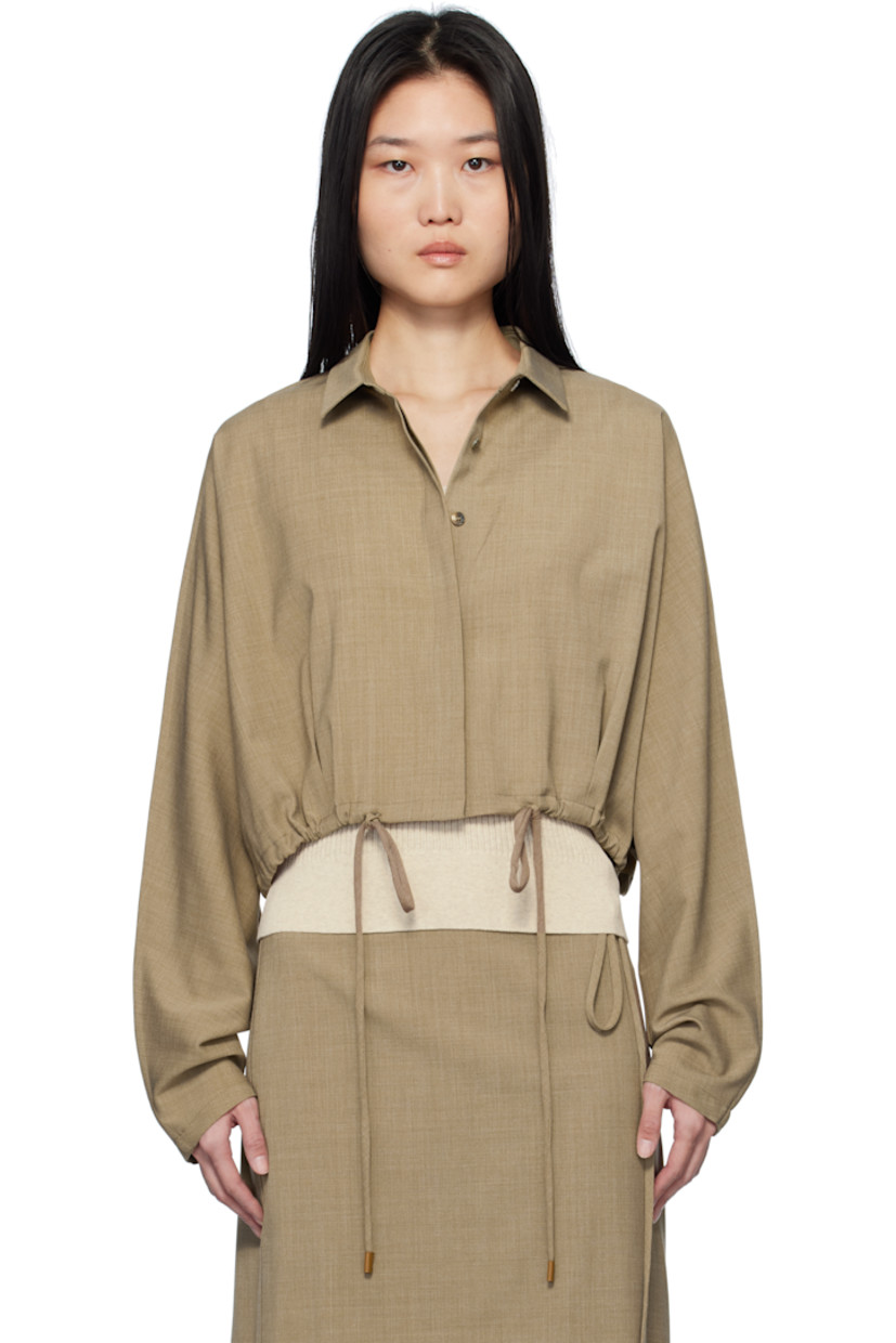 Plain-woven stretch wool- and polyester-blend jacket.

· Spread collar
· Concealed button closure
· Drawstring at cropped hem 
· Button fastening at cuffs
· Darts at back hem
· Unlined 

Supplier color: Beige