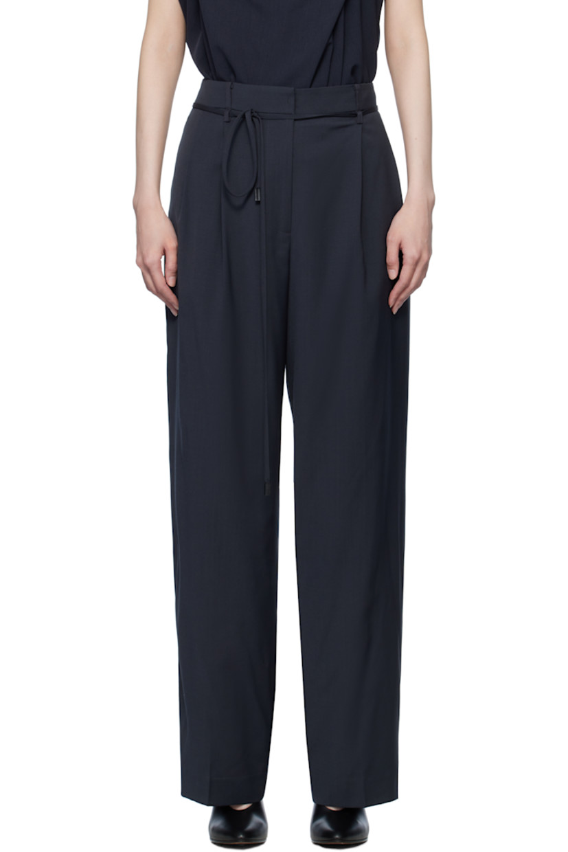 Stretch wool-blend twill trousers. 

· Belt loops 
· Removable self-tie belt
· Four-pocket styling
· Zip-fly
· Pleats at front
· Creased legs
· Full satin lining

Supplier color: Steel blue