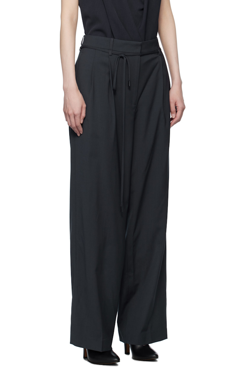 Stretch wool-blend twill trousers. 

· Belt loops 
· Removable self-tie belt
· Four-pocket styling
· Zip-fly
· Pleats at front
· Creased legs
· Full satin lining

Supplier color: Steel blue